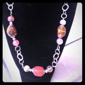 selling a very pretty rock stone necklace